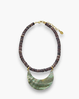 Gina Necklace with violet oyster shells and black lip shell half-moon pendant on a white background.