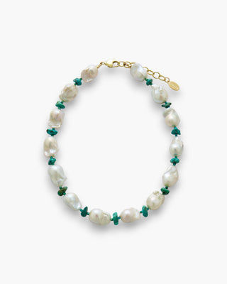 Mara Necklace with baroque pearls and turquoise on a white background